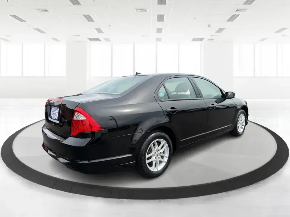 2012 Ford Fusion S (3FAHP0GA3CR) with an 2.5L I-4 DOHC engine, located at 1099 N County Rd 25A , Troy, OH, 45373, (937) 908-9800, 40.057079, -84.212883 - Need a dependable, budget-friendly sedan that can handle the weekday grind and still feel comfortable for weekend errands or a quick road trip to Dayton? This 2012 Ford Fusion S in sleek Tuxedo Black is a smart pick for commuters, first-time buyers, and growing families who want practical transporta - Photo#2