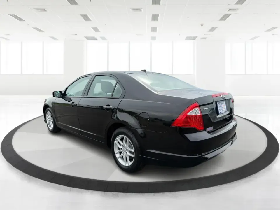 2012 Ford Fusion S (3FAHP0GA3CR) with an 2.5L I-4 DOHC engine, located at 1099 N County Rd 25A , Troy, OH, 45373, (937) 908-9800, 40.057079, -84.212883 - Need a dependable, budget-friendly sedan that can handle the weekday grind and still feel comfortable for weekend errands or a quick road trip to Dayton? This 2012 Ford Fusion S in sleek Tuxedo Black is a smart pick for commuters, first-time buyers, and growing families who want practical transporta - Photo#4