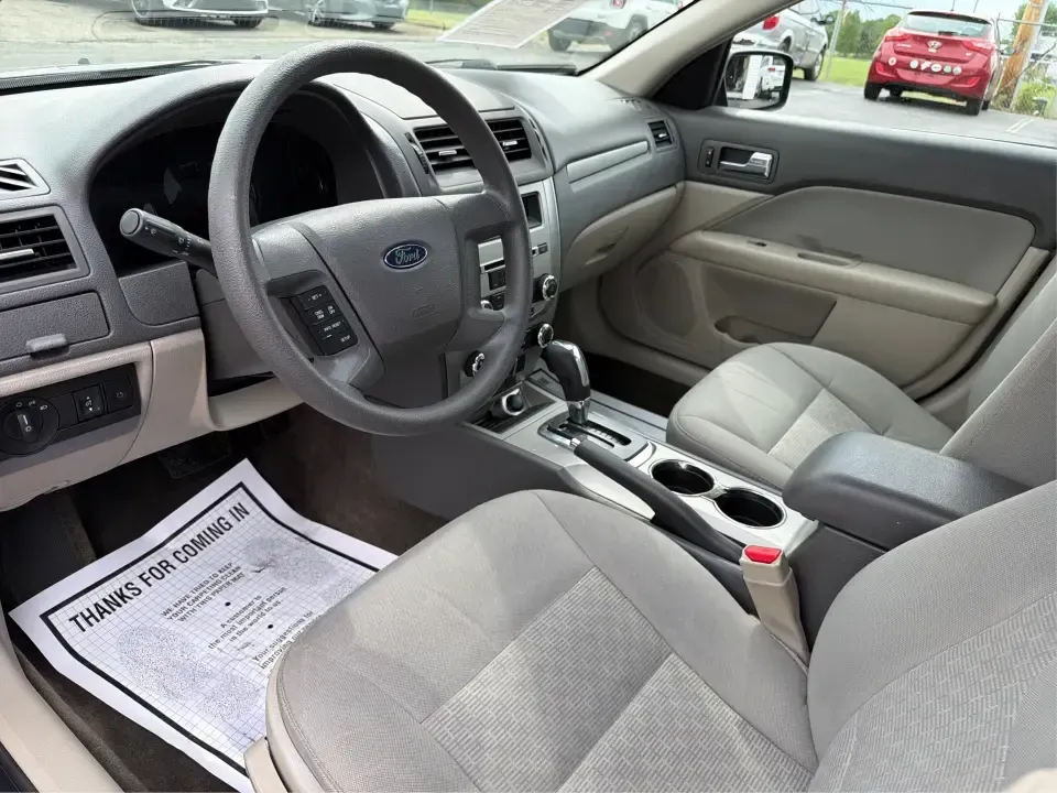 2012 Ford Fusion S (3FAHP0GA3CR) with an 2.5L I-4 DOHC engine, located at 1099 N County Rd 25A , Troy, OH, 45373, (937) 908-9800, 40.057079, -84.212883 - Need a dependable, budget-friendly sedan that can handle the weekday grind and still feel comfortable for weekend errands or a quick road trip to Dayton? This 2012 Ford Fusion S in sleek Tuxedo Black is a smart pick for commuters, first-time buyers, and growing families who want practical transporta - Photo#9