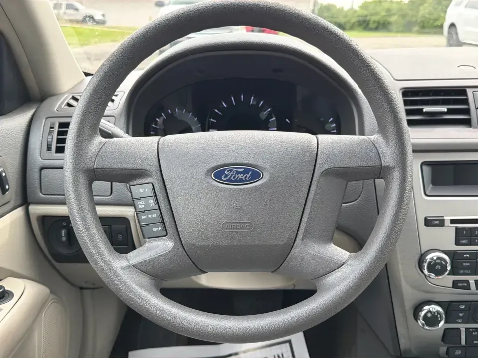 2012 Ford Fusion S (3FAHP0GA3CR) with an 2.5L I-4 DOHC engine, located at 1099 N County Rd 25A , Troy, OH, 45373, (937) 908-9800, 40.057079, -84.212883 - Need a dependable, budget-friendly sedan that can handle the weekday grind and still feel comfortable for weekend errands or a quick road trip to Dayton? This 2012 Ford Fusion S in sleek Tuxedo Black is a smart pick for commuters, first-time buyers, and growing families who want practical transporta - Photo#16