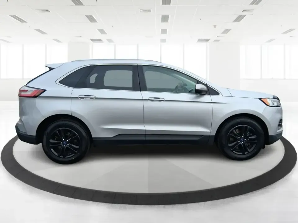 2019 Ford Edge SEL (2FMPK4J98KB) with an EcoBoost 2L I-4 gasoline direct injection engine, 6A transmission, located at 8750 N County Rd 25A, Piqua, OH, 45356, (937) 908-9800, 40.164391, -84.232513 - Picture your next road trip up I75, a week of school drop-offs, or a snowy Ohio commute that still feels calm and comfortable-this 2019 Ford Edge SEL AWD is built for real life. With confident all-wheel drive and a practical SUV layout, it's a smart fit for growing families, busy professionals, and - Photo#1