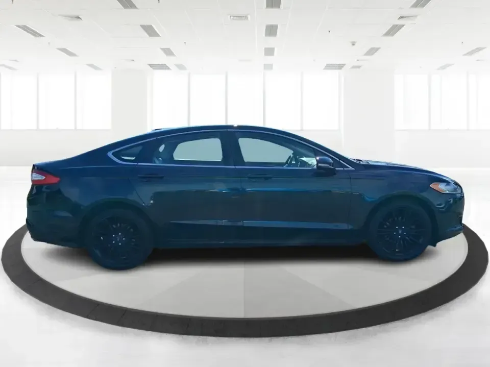 2014 Ford Fusion SE (3FA6P0HD8ER) with an 1.5L L4 DOHC 16V engine, located at 1099 N County Rd 25A , Troy, OH, 45373, (937) 908-9800, 40.057079, -84.212883 - Need a dependable commuter that still feels comfortable for date night in Beavercreek, errands around Xenia Station, and weekend drives out toward Caesars Creek? This 2014 Ford Fusion SE is the kind of smart, budget-friendly sedan that fits real life-easy to park downtown, smooth on longer stretches - Photo#1