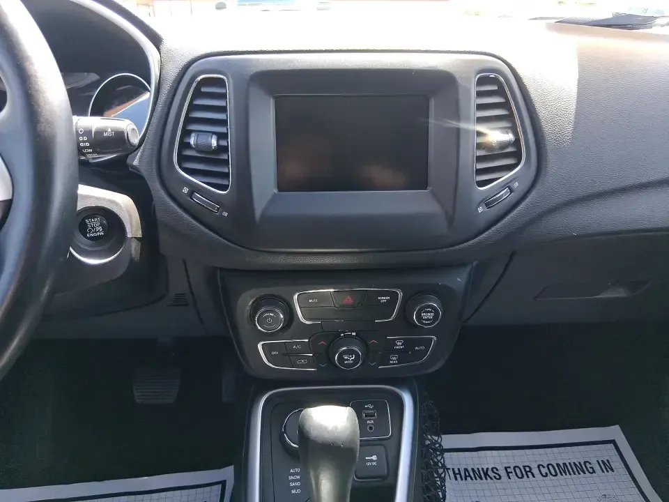 2018 Jeep Compass Latitude 4x4 (3C4NJDBB7JT) with an 2.4L L4 DOHC 16V engine, Manual/Standard transmission, located at 8750 N County Rd 25A, Piqua, OH, 45356, (937) 908-9800, 40.164391, -84.232513 - Weekend escapes, snowy school runs, and everyday commuting feel easier when your SUV is ready for whatever Ohio throws at it. This 2018 Jeep Compass Latitude 4x4 is built for drivers who want the flexibility to head from the weekday grind to a last-minute trip out toward Indian Lake or a scenic driv - Photo#13