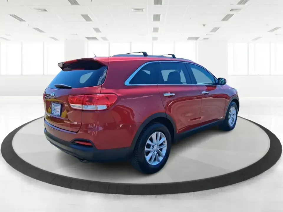 2017 Kia Sorento 2.4L LX (5XYPGDA37HG) with an 2.4L I-4 gasoline direct injection engine, 6A transmission, located at 8750 N County Rd 25A, Piqua, OH, 45356, (937) 908-9800, 40.164391, -84.232513 - Picture your next road trip out of Vandalia with room for the whole crew, the gear, and the groceries-without giving up everyday comfort. This **2017 Kia Sorento LX (2.4L)** in eye-catching **Remington Red** is the kind of SUV that fits real life: school drop-offs, long commutes to Dayton, weekend r - Photo#2