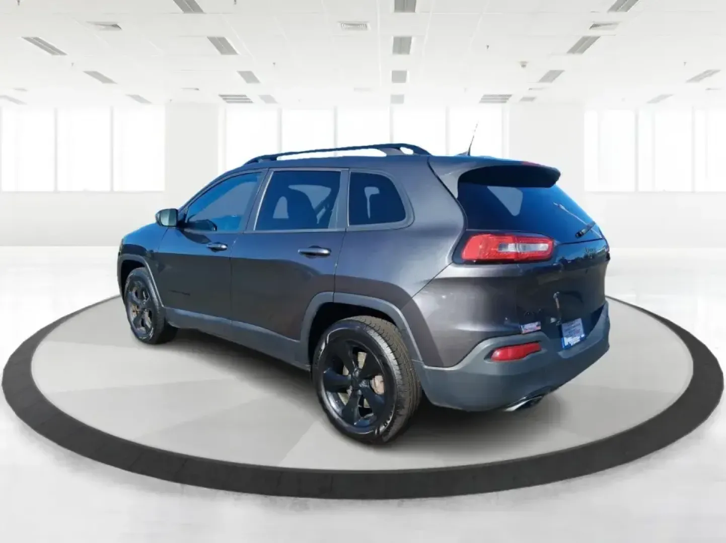 2016 Jeep Cherokee Latitude 4WD (1C4PJMCS7GW) with an 3.2L V6 DOHC 24V engine, 9-Speed Automatic transmission, located at 8750 N County Rd 25A, Piqua, OH, 45356, (937) 908-9800, 40.164391, -84.232513 - Weekend getaways to Indian Lake, snowy school runs, and daily commutes up I75 all call for an SUV that feels confident in any season-and this **2016 Jeep Cherokee Altitude 4WD** is built for exactly that kind of Ohio lifestyle. Finished in **Granite Crystal Metallic Clearcoat**, this Cherokee brings- Photo#4