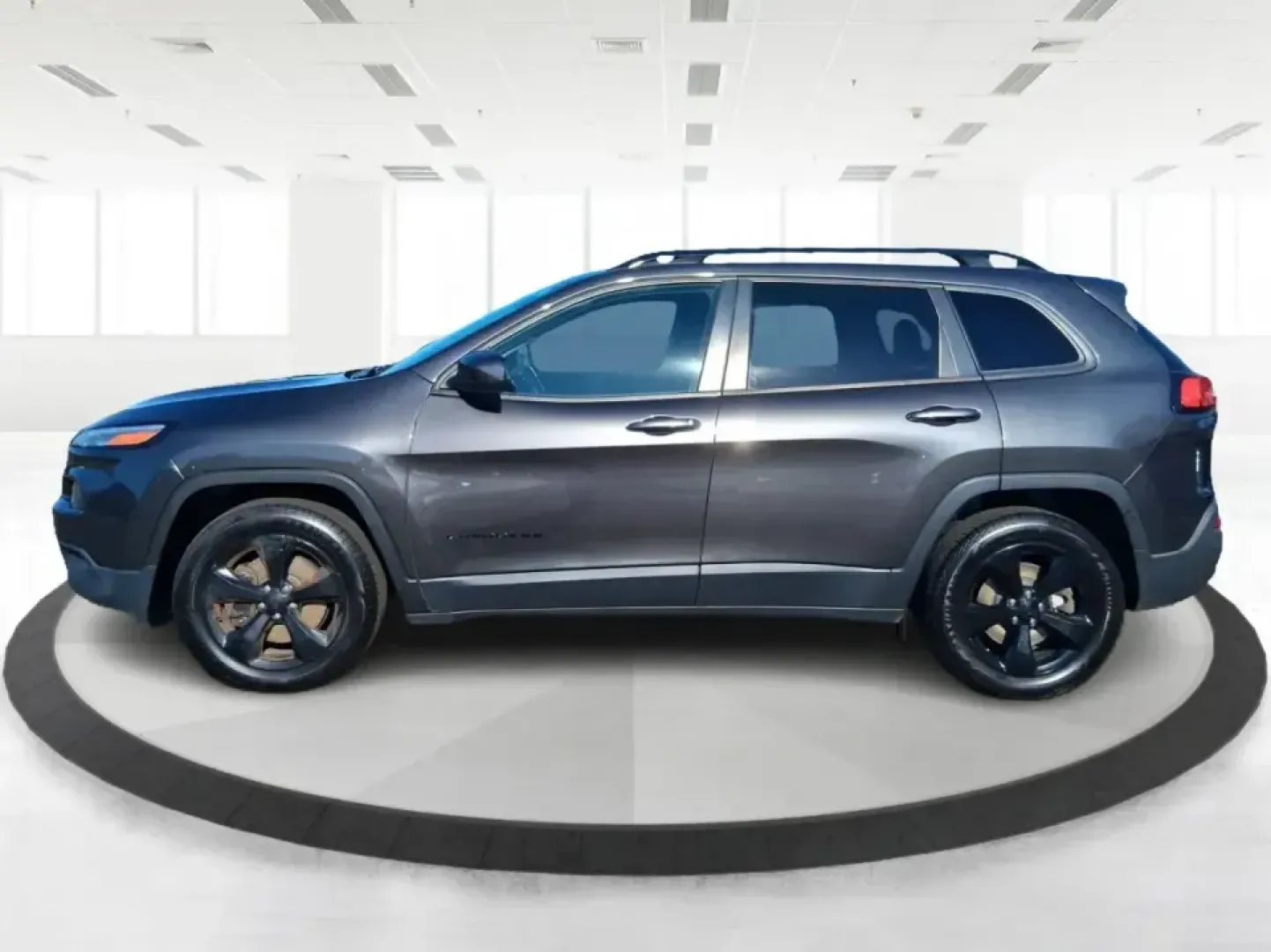 2016 Jeep Cherokee Latitude 4WD (1C4PJMCS7GW) with an 3.2L V6 DOHC 24V engine, 9-Speed Automatic transmission, located at 8750 N County Rd 25A, Piqua, OH, 45356, (937) 908-9800, 40.164391, -84.232513 - Weekend getaways to Indian Lake, snowy school runs, and daily commutes up I75 all call for an SUV that feels confident in any season-and this **2016 Jeep Cherokee Altitude 4WD** is built for exactly that kind of Ohio lifestyle. Finished in **Granite Crystal Metallic Clearcoat**, this Cherokee brings- Photo#5