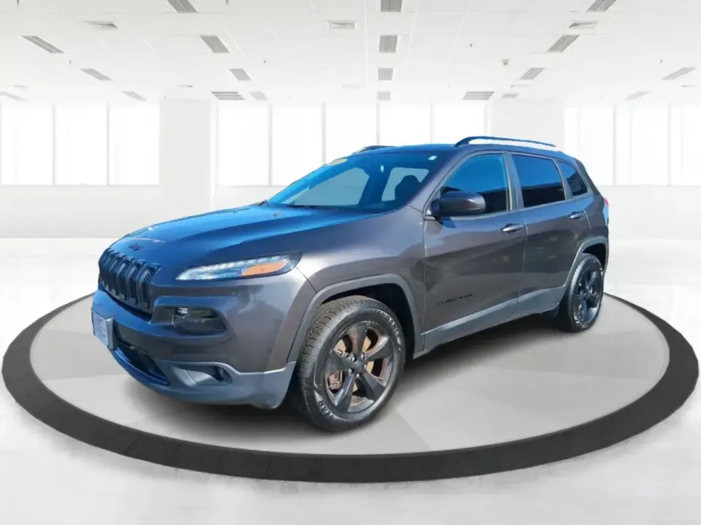 2016 Jeep Cherokee Latitude 4WD (1C4PJMCS7GW) with an 3.2L V6 DOHC 24V engine, 9-Speed Automatic transmission, located at 8750 N County Rd 25A, Piqua, OH, 45356, (937) 908-9800, 40.164391, -84.232513 - Weekend getaways to Indian Lake, snowy school runs, and daily commutes up I75 all call for an SUV that feels confident in any season-and this **2016 Jeep Cherokee Altitude 4WD** is built for exactly that kind of Ohio lifestyle. Finished in **Granite Crystal Metallic Clearcoat**, this Cherokee brings- Photo#8