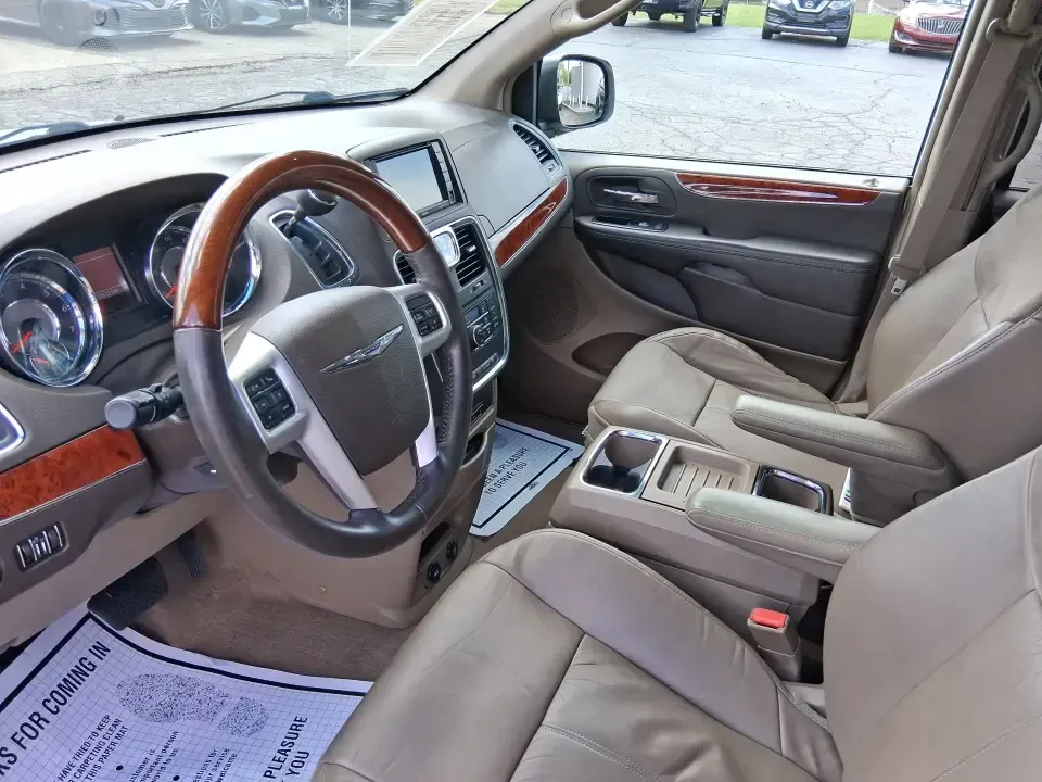 2014 Chrysler Town and Country Limited (2C4RC1GGXER) with an Pentastar 3.6L V-6 DOHC engine, 6-Speed Automatic transmission, located at 4508 South Dixie Dr, Moraine, OH, 45439, (937) 908-9800, 39.689976, -84.218452 - Road-trip ready and family-approved, this 2014 Chrysler Town and Country Limited is the kind of minivan that fits real life in Moraine-school drop-offs, grocery runs, weekend tournaments, and those longer drives up I-75 or across town toward Dayton. Finished in Bright White Clearcoat, it blends a - Photo#8