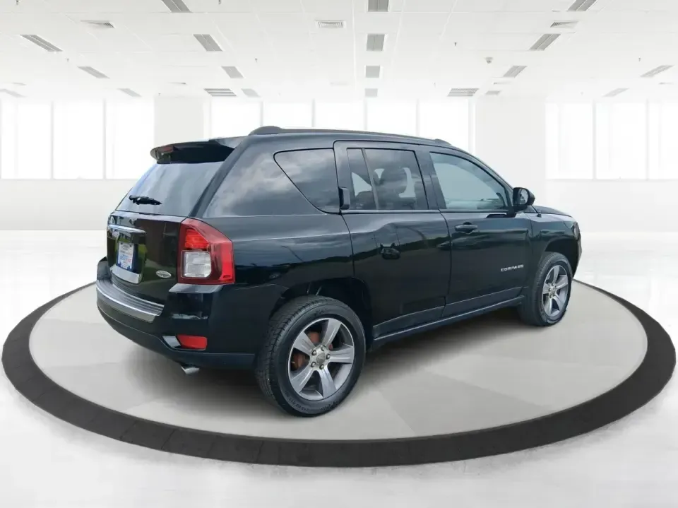 2017 Jeep Compass High Altitude FWD (1C4NJCEBXHD) with an 2.4L L4 DOHC 16V engine, CVT transmission, located at 1951 S Dayton Lakeview Rd., New Carlisle, OH, 45344, (937) 908-9800, 39.890999, -84.050255 - Picture your next week looking simpler: a comfortable SUV for the daily commute down I70, school drop-offs, and spontaneous Saturday drives to Buck Creek State Park-without feeling like you have to put your life on hold while you shop for financing. This 2017 Jeep Compass High Altitude FWD in Black - Photo#2