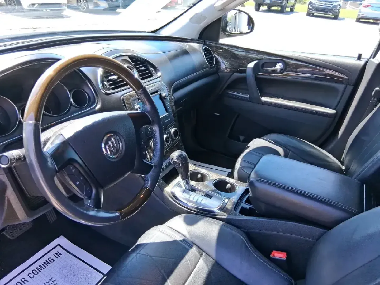 2013 Buick Enclave Premium (5GAKVDKDXDJ) with an 3.6L V-6 gasoline direct injection engine, 6-Speed Automatic Overdrive transmission, located at 880 E. National Road, Vandalia, OH, 45377, (937) 908-9800, 39.891918, -84.183594 - Pack up the kids, cue up a road-trip playlist, and head out with confidence-this 2013 Buick Enclave Premium is built for real life in and around Vandalia, whether you're doing school drop-offs, commuting to Dayton, or loading up for a weekend at Taylorsville MetroPark. With three-row versatility, up - Photo#9