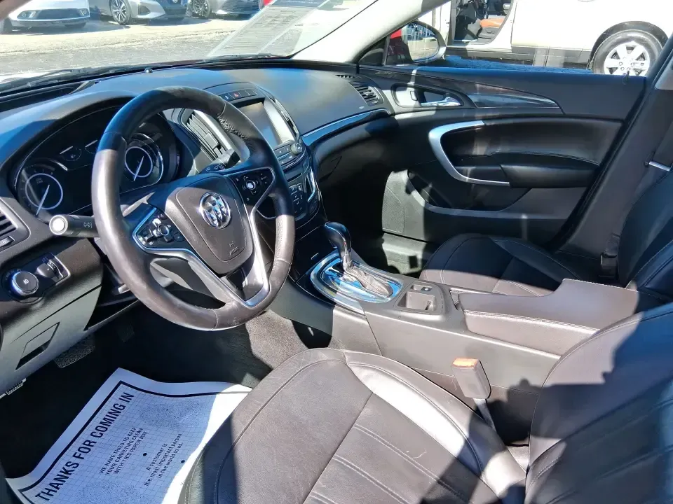 2017 Buick Regal Turbo Sport Touring (2G4GL5EX9H9) with an 2L I-4 gasoline direct injection engine, 6A transmission, located at 8750 N County Rd 25A, Piqua, OH, 45356, (937) 908-9800, 40.164391, -84.232513 - Need a sporty, comfortable commuter that still feels special on date night, errands around town, or a weekend run up I75? This 2017 Buick Regal Turbo Sport Touring in Crimson Red Tintcoat fits the lifestyle of drivers who want a refined sedan with confident power for daily miles, plus the kind of fe - Photo#9