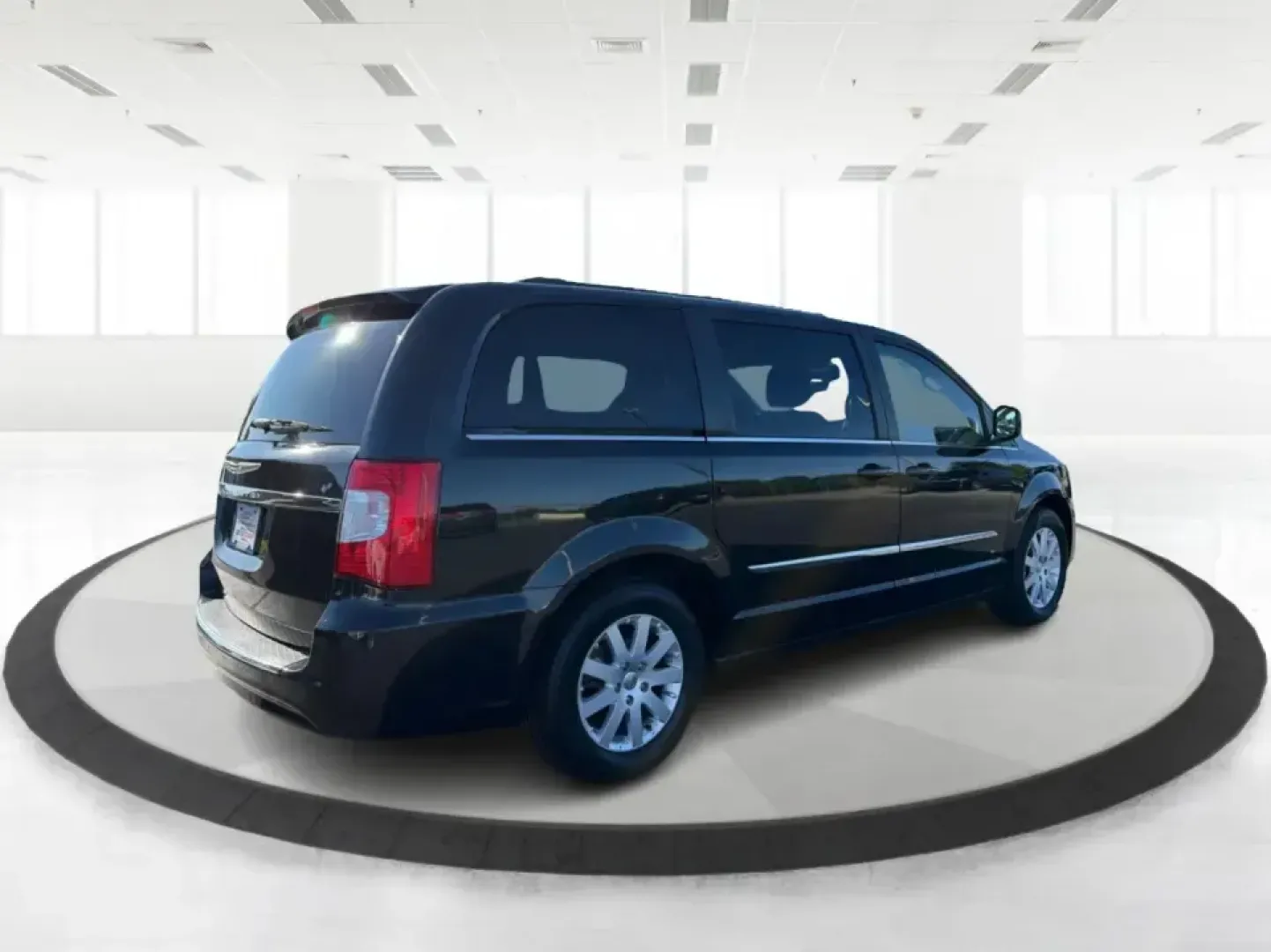 2013 Chrysler Town and Country Touring (2C4RC1BG8DR) with an Pentastar 3.6L V-6 DOHC engine, 6-Speed Automatic transmission, located at 8750 N County Rd 25A, Piqua, OH, 45356, (937) 908-9800, 40.164391, -84.232513 - Road-trip weekends, school drop-offs, and big-box store runs feel a lot easier when you've got a minivan that's built for real life. This 2013 Chrysler Town and Country Touring in Brilliant Black Crystal Pearlcoat is a smart pick for growing families, busy commuters, and budget-conscious buyers wh- Photo#2