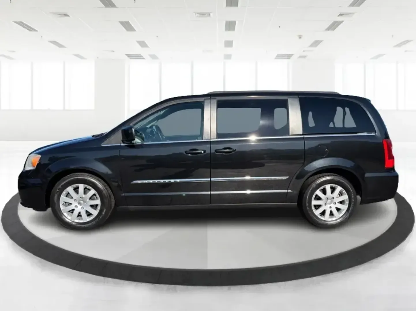 2013 Chrysler Town and Country Touring (2C4RC1BG8DR) with an Pentastar 3.6L V-6 DOHC engine, 6-Speed Automatic transmission, located at 8750 N County Rd 25A, Piqua, OH, 45356, (937) 908-9800, 40.164391, -84.232513 - Road-trip weekends, school drop-offs, and big-box store runs feel a lot easier when you've got a minivan that's built for real life. This 2013 Chrysler Town and Country Touring in Brilliant Black Crystal Pearlcoat is a smart pick for growing families, busy commuters, and budget-conscious buyers wh- Photo#5