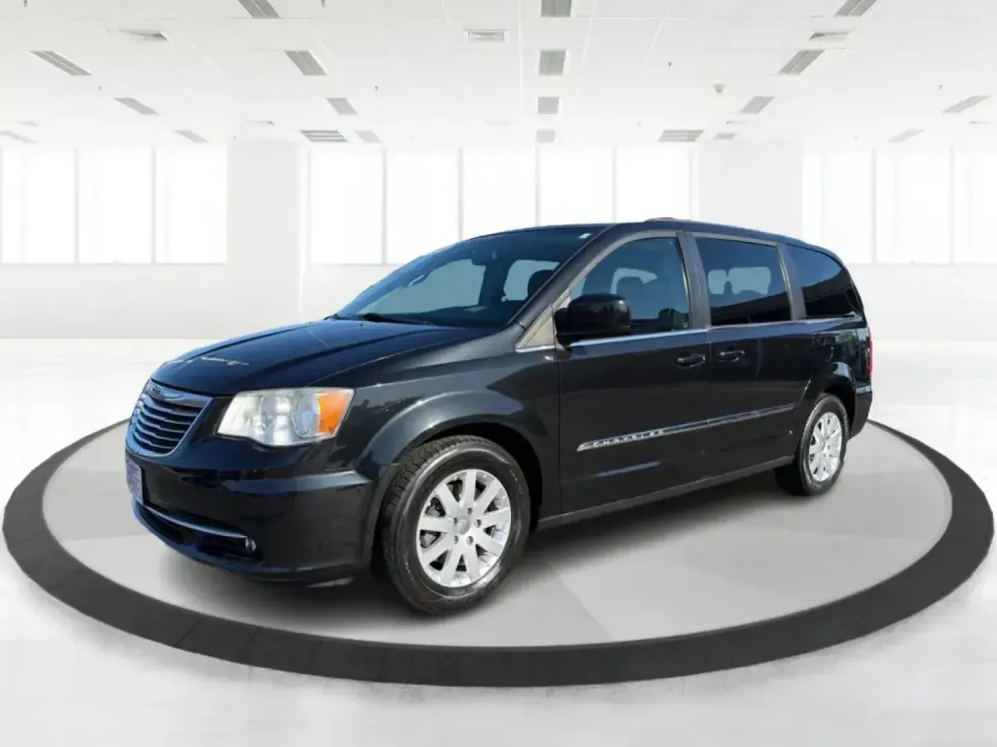 2013 Chrysler Town and Country Touring (2C4RC1BG8DR) with an Pentastar 3.6L V-6 DOHC engine, 6-Speed Automatic transmission, located at 8750 N County Rd 25A, Piqua, OH, 45356, (937) 908-9800, 40.164391, -84.232513 - Road-trip weekends, school drop-offs, and big-box store runs feel a lot easier when you've got a minivan that's built for real life. This 2013 Chrysler Town and Country Touring in Brilliant Black Crystal Pearlcoat is a smart pick for growing families, busy commuters, and budget-conscious buyers wh- Photo#8