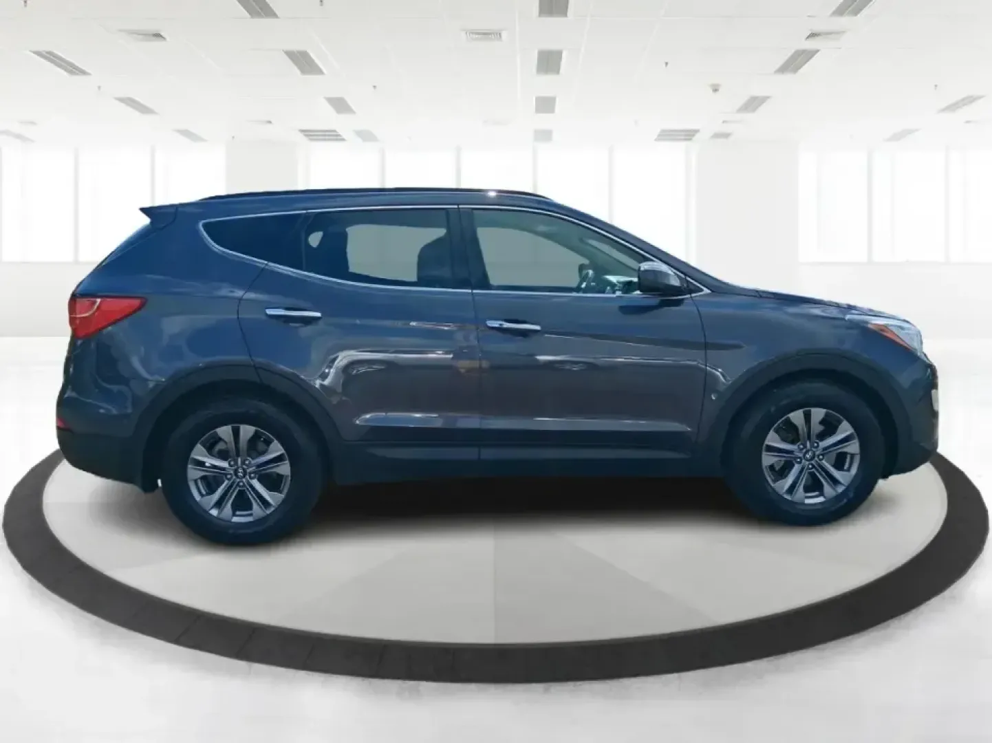 2015 Hyundai Santa Fe 2.4L (5XYZUDLB3FG) with an Theta II 2.4L I-4 gasoline direct injection engine, 6-Speed Automatic transmission, located at 1230 East Main St, Xenia, OH, 45385, (937) 908-9800, 39.688026, -83.910172 - Pack up the kids, load the cooler, and point your weekend plans toward the open road-this 2015 Hyundai Santa Fe 2.4L in Platinum Graphite is the kind of SUV that fits real life in Riverside. Whether you're commuting down I-75, running errands along Woodman Dr, or heading out for a day at Eastwood Me - Photo#1