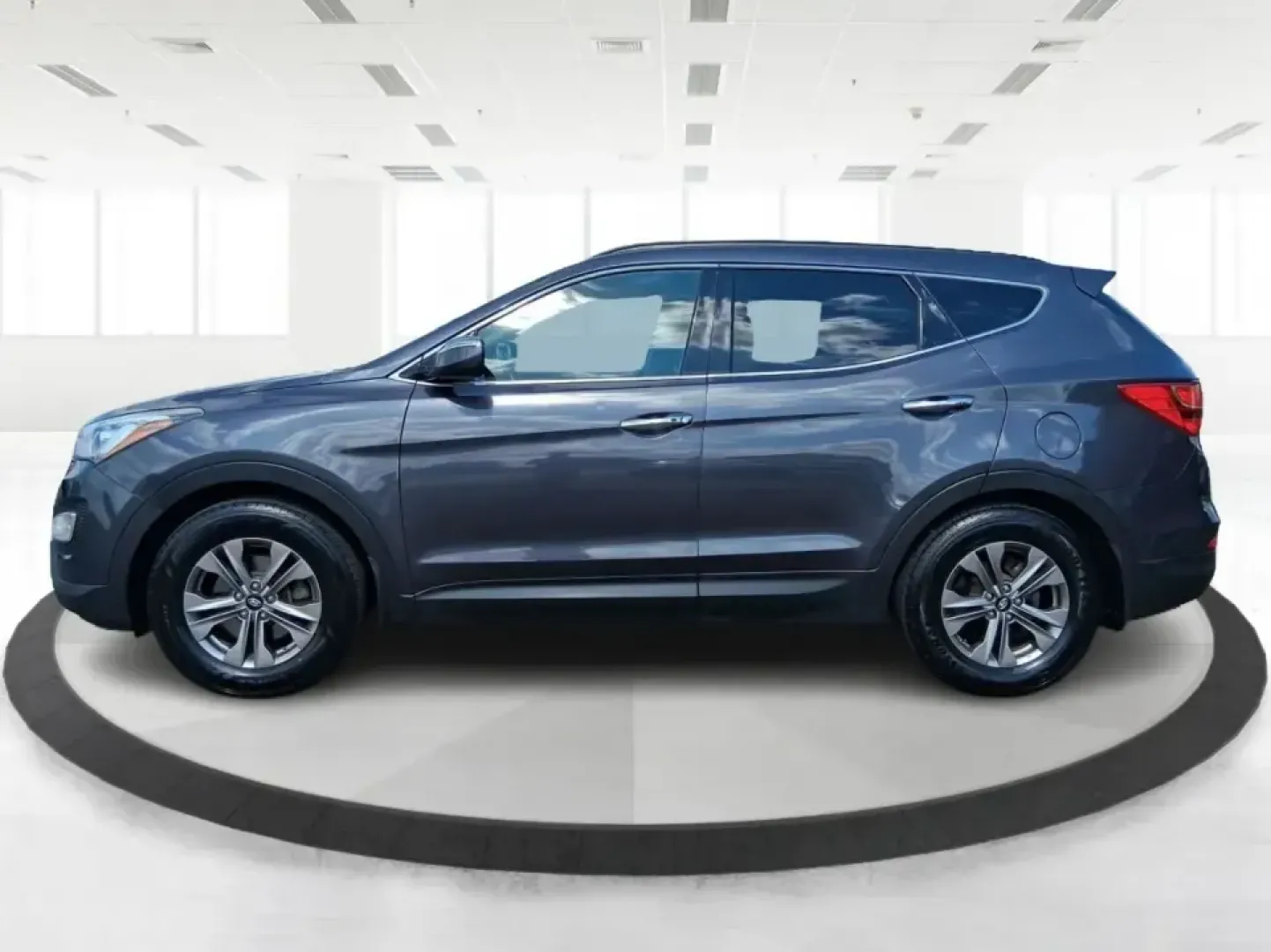 2015 Hyundai Santa Fe 2.4L (5XYZUDLB3FG) with an Theta II 2.4L I-4 gasoline direct injection engine, 6-Speed Automatic transmission, located at 1230 East Main St, Xenia, OH, 45385, (937) 908-9800, 39.688026, -83.910172 - Pack up the kids, load the cooler, and point your weekend plans toward the open road-this 2015 Hyundai Santa Fe 2.4L in Platinum Graphite is the kind of SUV that fits real life in Riverside. Whether you're commuting down I-75, running errands along Woodman Dr, or heading out for a day at Eastwood Me - Photo#5