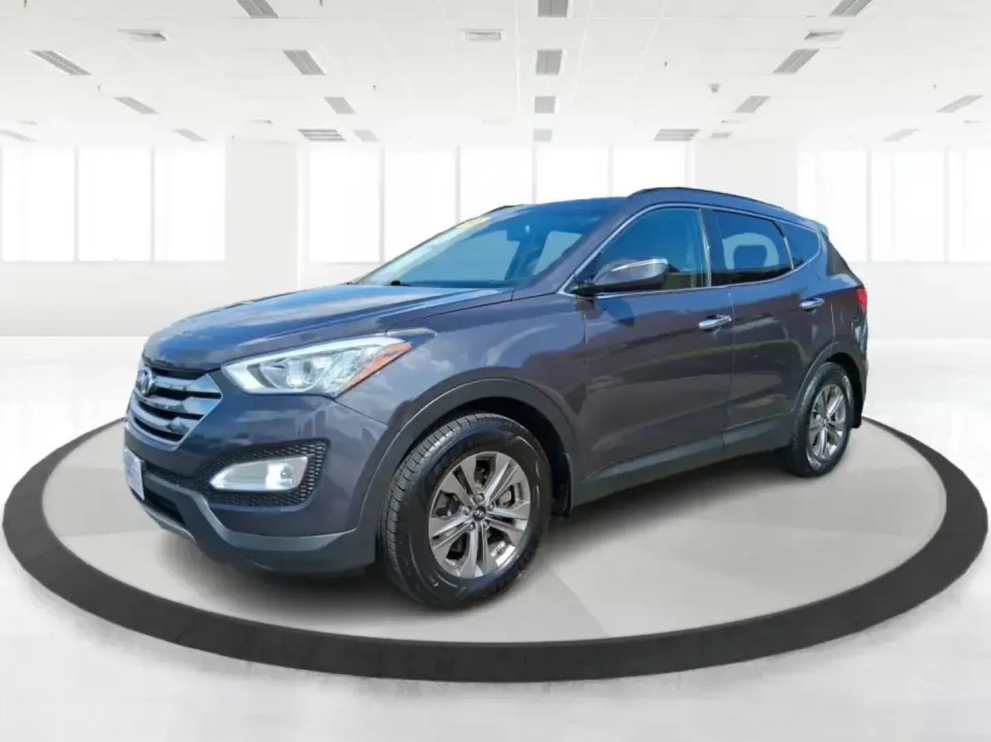 2015 Hyundai Santa Fe 2.4L (5XYZUDLB3FG) with an Theta II 2.4L I-4 gasoline direct injection engine, 6-Speed Automatic transmission, located at 1230 East Main St, Xenia, OH, 45385, (937) 908-9800, 39.688026, -83.910172 - Pack up the kids, load the cooler, and point your weekend plans toward the open road-this 2015 Hyundai Santa Fe 2.4L in Platinum Graphite is the kind of SUV that fits real life in Riverside. Whether you're commuting down I-75, running errands along Woodman Dr, or heading out for a day at Eastwood Me - Photo#8