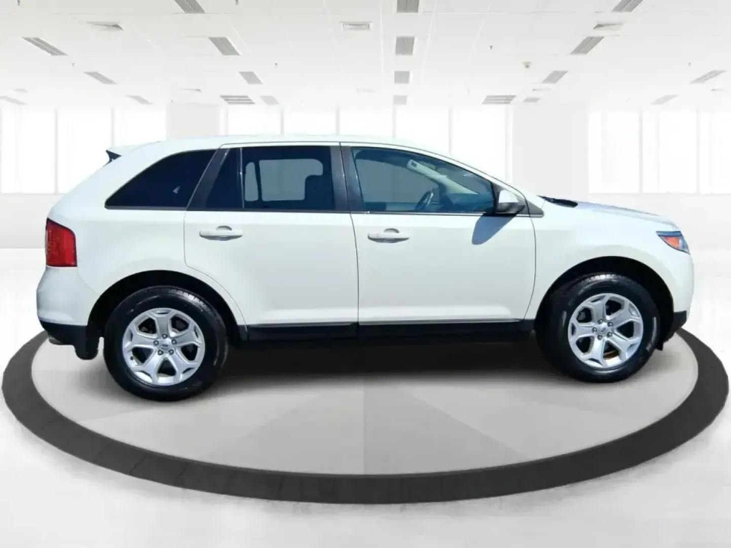 2013 Ford Edge SEL (2FMDK3JC2DB) with an 3.5L V6 DOHC 24V engine, 6-Speed Automatic transmission, located at 8750 N County Rd 25A, Piqua, OH, 45356, (937) 908-9800, 40.164391, -84.232513 - Picture your next road trip up I75 or a busy week of school dropoffs and commuting done in a roomy SUV that feels comfortable, confident, and ready for everyday Ohio life. This 2013 Ford Edge SEL is a smart fit for drivers who want midsize versatility without the bulky footprint-great for growing fa - Photo#1