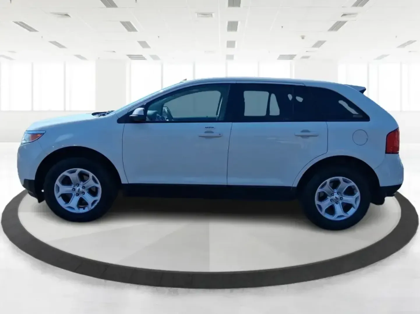 2013 Ford Edge SEL (2FMDK3JC2DB) with an 3.5L V6 DOHC 24V engine, 6-Speed Automatic transmission, located at 8750 N County Rd 25A, Piqua, OH, 45356, (937) 908-9800, 40.164391, -84.232513 - Picture your next road trip up I75 or a busy week of school dropoffs and commuting done in a roomy SUV that feels comfortable, confident, and ready for everyday Ohio life. This 2013 Ford Edge SEL is a smart fit for drivers who want midsize versatility without the bulky footprint-great for growing fa - Photo#5