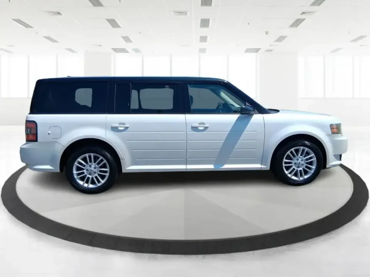 2011 Ford Flex Titanium (2FMGK5DC2BB) with an Duratec 3.5L V-6 DOHC engine, 6-Speed Automatic Overdrive transmission, located at 1951 S Dayton Lakeview Rd., New Carlisle, OH, 45344, (937) 908-9800, 39.890999, -84.050255 - Road-trip ready and family-friendly without feeling like a bus, this 2011 Ford Flex Limited | Titanium is the kind of crossover that fits real life-school drop-offs, long commutes, weekend tournaments, and those last-minute runs for groceries when the cargo space actually matters. Finished in White- Photo#1