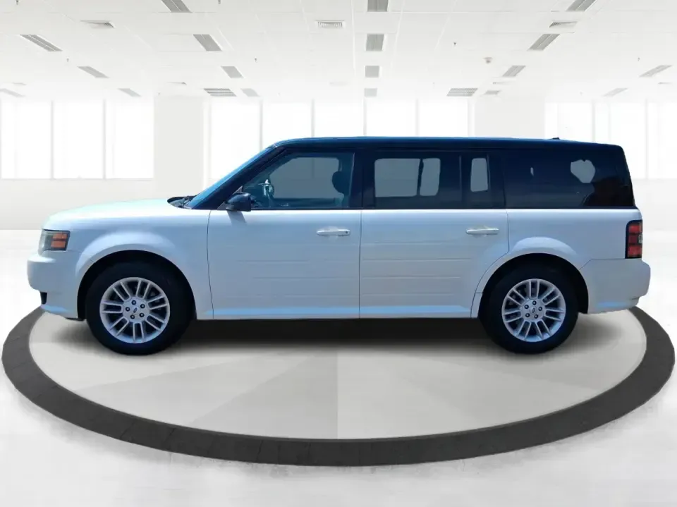 2011 Ford Flex Titanium (2FMGK5DC2BB) with an Duratec 3.5L V-6 DOHC engine, 6-Speed Automatic Overdrive transmission, located at 1951 S Dayton Lakeview Rd., New Carlisle, OH, 45344, (937) 908-9800, 39.890999, -84.050255 - Road-trip ready and family-friendly without feeling like a bus, this 2011 Ford Flex Limited | Titanium is the kind of crossover that fits real life-school drop-offs, long commutes, weekend tournaments, and those last-minute runs for groceries when the cargo space actually matters. Finished in White - Photo#5