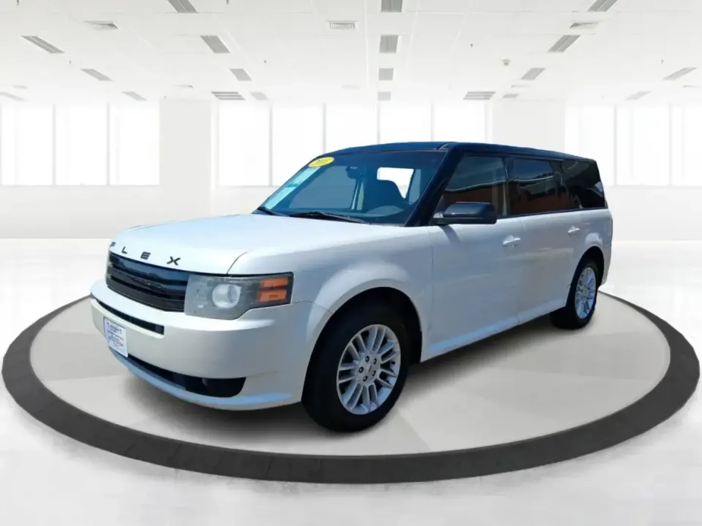 2011 Ford Flex Titanium (2FMGK5DC2BB) with an Duratec 3.5L V-6 DOHC engine, 6-Speed Automatic Overdrive transmission, located at 1951 S Dayton Lakeview Rd., New Carlisle, OH, 45344, (937) 908-9800, 39.890999, -84.050255 - Road-trip ready and family-friendly without feeling like a bus, this 2011 Ford Flex Limited | Titanium is the kind of crossover that fits real life-school drop-offs, long commutes, weekend tournaments, and those last-minute runs for groceries when the cargo space actually matters. Finished in White- Photo#8