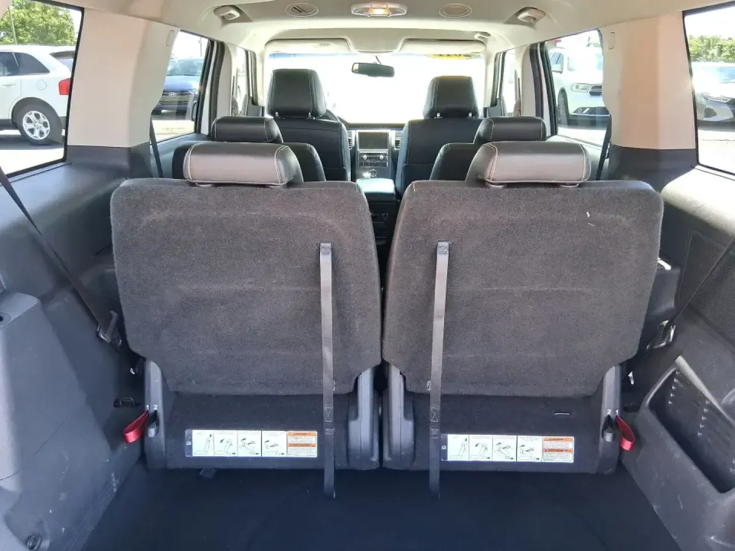 2011 Ford Flex Titanium (2FMGK5DC2BB) with an Duratec 3.5L V-6 DOHC engine, 6-Speed Automatic Overdrive transmission, located at 1951 S Dayton Lakeview Rd., New Carlisle, OH, 45344, (937) 908-9800, 39.890999, -84.050255 - Road-trip ready and family-friendly without feeling like a bus, this 2011 Ford Flex Limited | Titanium is the kind of crossover that fits real life-school drop-offs, long commutes, weekend tournaments, and those last-minute runs for groceries when the cargo space actually matters. Finished in White- Photo#12