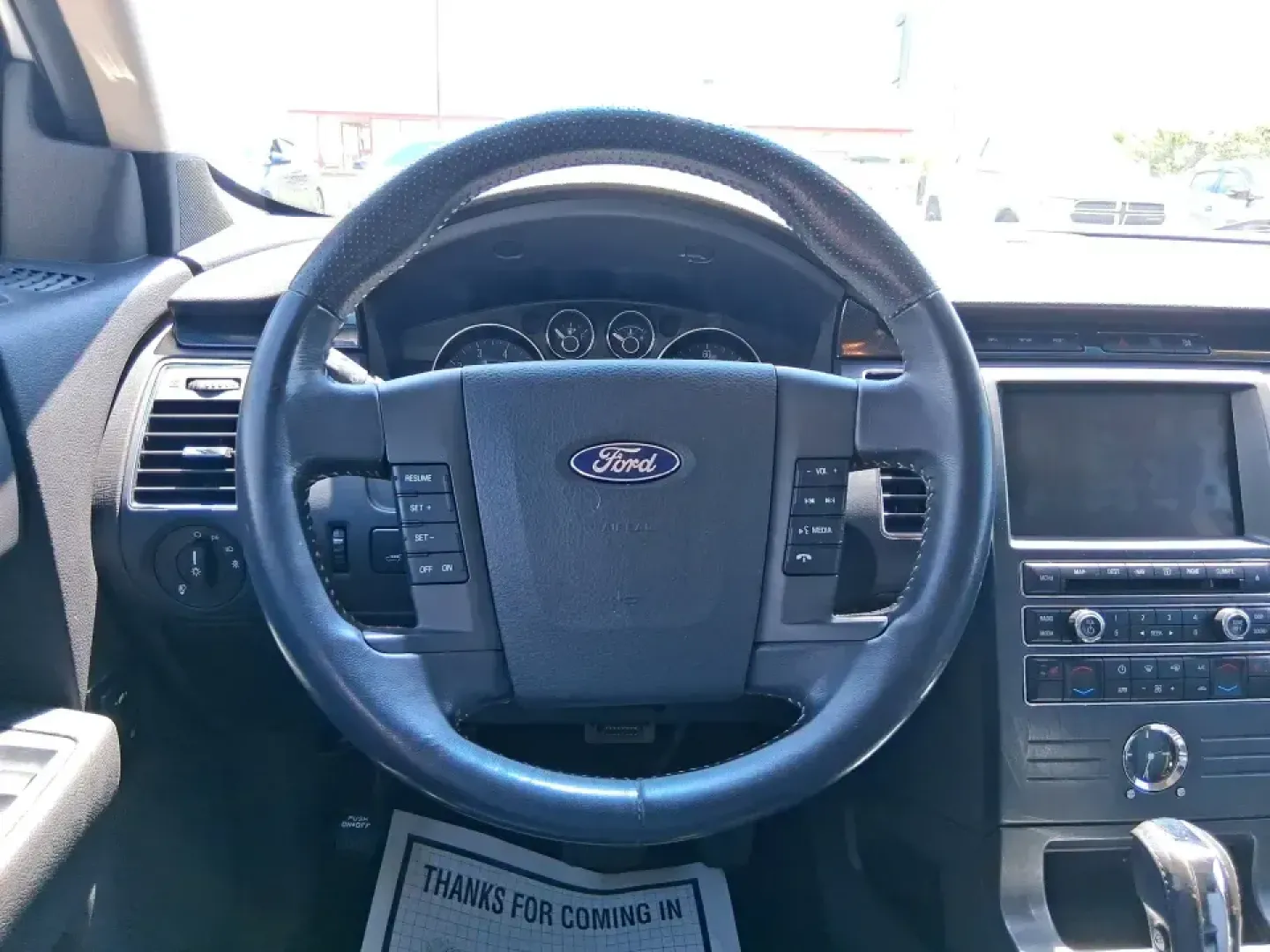 2011 Ford Flex Titanium (2FMGK5DC2BB) with an Duratec 3.5L V-6 DOHC engine, 6-Speed Automatic Overdrive transmission, located at 1951 S Dayton Lakeview Rd., New Carlisle, OH, 45344, (937) 908-9800, 39.890999, -84.050255 - Road-trip ready and family-friendly without feeling like a bus, this 2011 Ford Flex Limited | Titanium is the kind of crossover that fits real life-school drop-offs, long commutes, weekend tournaments, and those last-minute runs for groceries when the cargo space actually matters. Finished in White- Photo#16