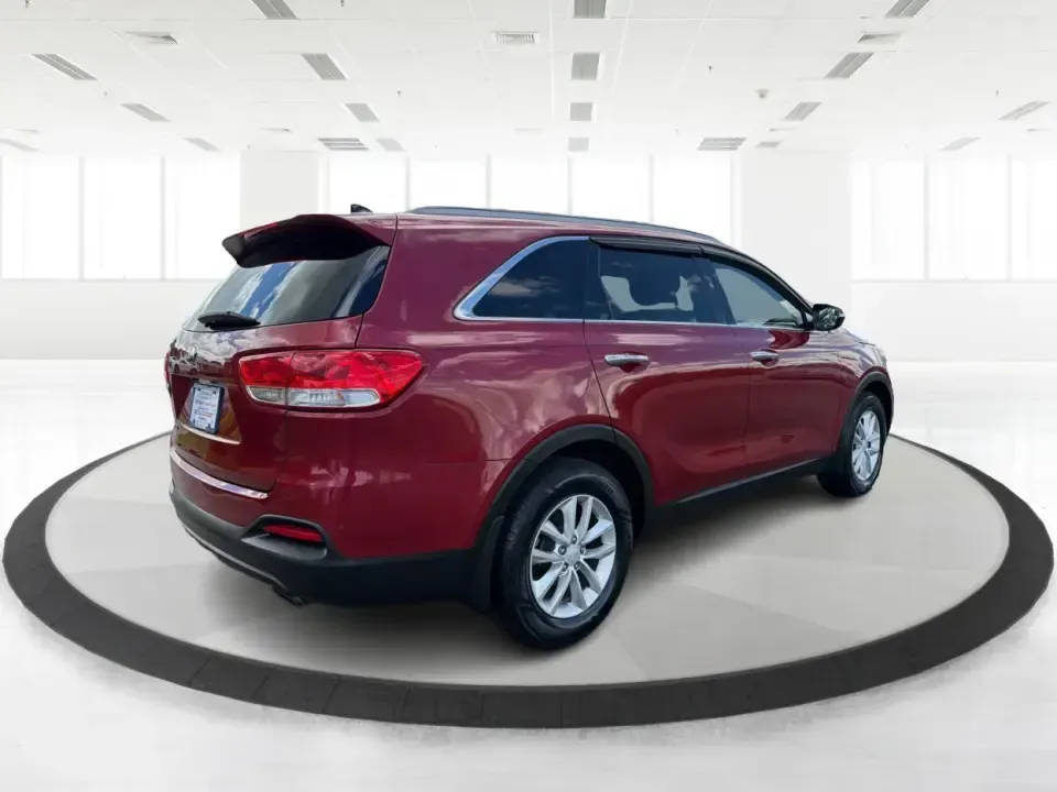 2016 Kia Sorento 2.4L LX (5XYPG4A38GG) with an 2.4L I-4 gasoline direct injection engine, 6-Speed Automatic transmission, located at 880 E. National Road, Vandalia, OH, 45377, (937) 908-9800, 39.891918, -84.183594 - Load up the family, point the hood toward I75, and make weekend plans feel easy again-this 2016 Kia Sorento LX is the kind of midsize SUV that fits real life in Vandalia, from school runs and grocery stops to road trips toward Dayton or a quick getaway out by the Great Miami River. Finished in stand - Photo#2
