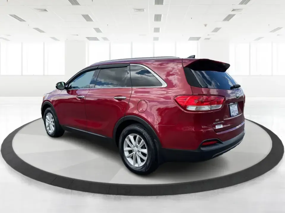 2016 Kia Sorento 2.4L LX (5XYPG4A38GG) with an 2.4L I-4 gasoline direct injection engine, 6-Speed Automatic transmission, located at 880 E. National Road, Vandalia, OH, 45377, (937) 908-9800, 39.891918, -84.183594 - Load up the family, point the hood toward I75, and make weekend plans feel easy again-this 2016 Kia Sorento LX is the kind of midsize SUV that fits real life in Vandalia, from school runs and grocery stops to road trips toward Dayton or a quick getaway out by the Great Miami River. Finished in stand - Photo#4