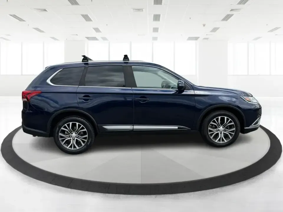 2018 Mitsubishi Outlander SEL (JA4AD3A39JJ) with an 2.4L I-4 variable valve control engine, CVT transmission, located at 1230 East Main St, Xenia, OH, 45385, (937) 908-9800, 39.688026, -83.910172 - Weekend road trips to John Bryan State Park, daily commutes down US-35, or school-drop runs around Xenia's neighborhoods-this 2018 Mitsubishi Outlander SEL is the kind of SUV that fits real life. Finished in eye-catching Cosmic Blue Metallic and built with three-row flexibility, it's a smart pick fo - Photo#1