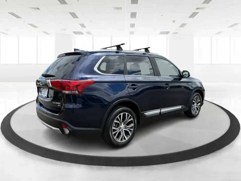 2018 Mitsubishi Outlander SEL (JA4AD3A39JJ) with an 2.4L I-4 variable valve control engine, CVT transmission, located at 1230 East Main St, Xenia, OH, 45385, (937) 908-9800, 39.688026, -83.910172 - Weekend road trips to John Bryan State Park, daily commutes down US-35, or school-drop runs around Xenia's neighborhoods-this 2018 Mitsubishi Outlander SEL is the kind of SUV that fits real life. Finished in eye-catching Cosmic Blue Metallic and built with three-row flexibility, it's a smart pick fo - Photo#2