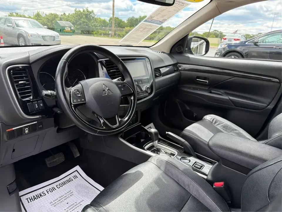 2018 Mitsubishi Outlander SEL (JA4AD3A39JJ) with an 2.4L I-4 variable valve control engine, CVT transmission, located at 1230 East Main St, Xenia, OH, 45385, (937) 908-9800, 39.688026, -83.910172 - Weekend road trips to John Bryan State Park, daily commutes down US-35, or school-drop runs around Xenia's neighborhoods-this 2018 Mitsubishi Outlander SEL is the kind of SUV that fits real life. Finished in eye-catching Cosmic Blue Metallic and built with three-row flexibility, it's a smart pick fo - Photo#9
