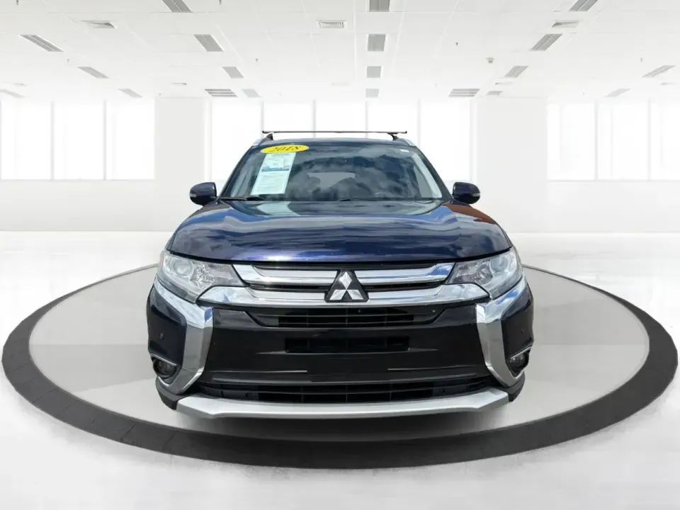2018 Mitsubishi Outlander SEL (JA4AD3A39JJ) with an 2.4L I-4 variable valve control engine, CVT transmission, located at 4508 South Dixie Dr, Moraine, OH, 45439, (937) 908-9800, 39.689976, -84.218452 - Weekend road trips to John Bryan State Park, daily commutes down US-35, or school-drop runs around Xenia's neighborhoods-this 2018 Mitsubishi Outlander SEL is the kind of SUV that fits real life. Finished in eye-catching Cosmic Blue Metallic and built with three-row flexibility, it's a smart pick fo - Photo#7