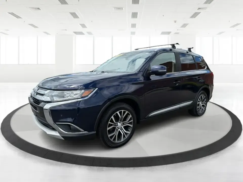 2018 Mitsubishi Outlander SEL (JA4AD3A39JJ) with an 2.4L I-4 variable valve control engine, CVT transmission, located at 4508 South Dixie Dr, Moraine, OH, 45439, (937) 908-9800, 39.689976, -84.218452 - Weekend road trips to John Bryan State Park, daily commutes down US-35, or school-drop runs around Xenia's neighborhoods-this 2018 Mitsubishi Outlander SEL is the kind of SUV that fits real life. Finished in eye-catching Cosmic Blue Metallic and built with three-row flexibility, it's a smart pick fo - Photo#8