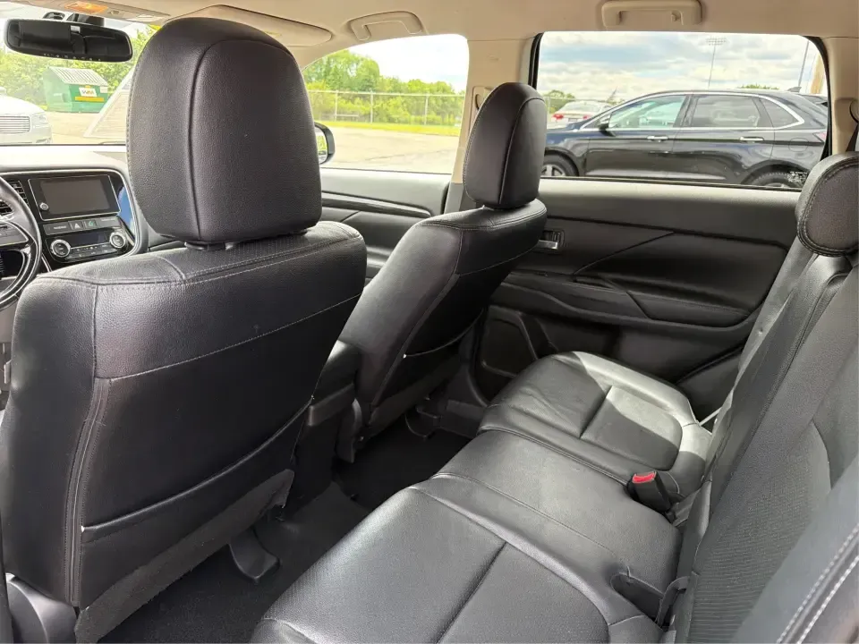 2018 Mitsubishi Outlander SEL (JA4AD3A39JJ) with an 2.4L I-4 variable valve control engine, CVT transmission, located at 4508 South Dixie Dr, Moraine, OH, 45439, (937) 908-9800, 39.689976, -84.218452 - Weekend road trips to John Bryan State Park, daily commutes down US-35, or school-drop runs around Xenia's neighborhoods-this 2018 Mitsubishi Outlander SEL is the kind of SUV that fits real life. Finished in eye-catching Cosmic Blue Metallic and built with three-row flexibility, it's a smart pick fo - Photo#10