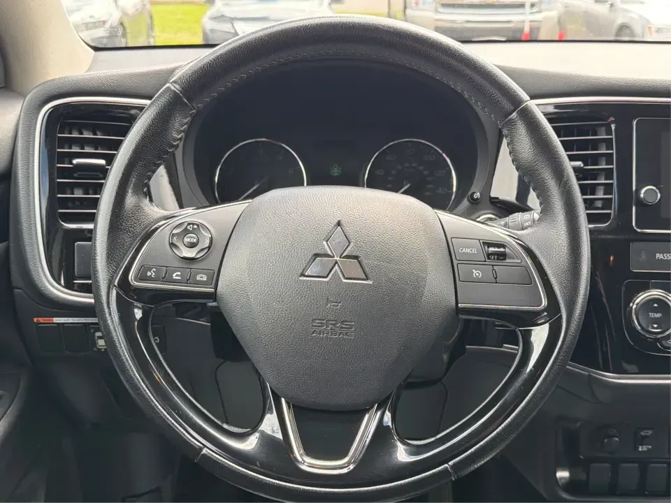 2018 Mitsubishi Outlander SEL (JA4AD3A39JJ) with an 2.4L I-4 variable valve control engine, CVT transmission, located at 4508 South Dixie Dr, Moraine, OH, 45439, (937) 908-9800, 39.689976, -84.218452 - Weekend road trips to John Bryan State Park, daily commutes down US-35, or school-drop runs around Xenia's neighborhoods-this 2018 Mitsubishi Outlander SEL is the kind of SUV that fits real life. Finished in eye-catching Cosmic Blue Metallic and built with three-row flexibility, it's a smart pick fo - Photo#16