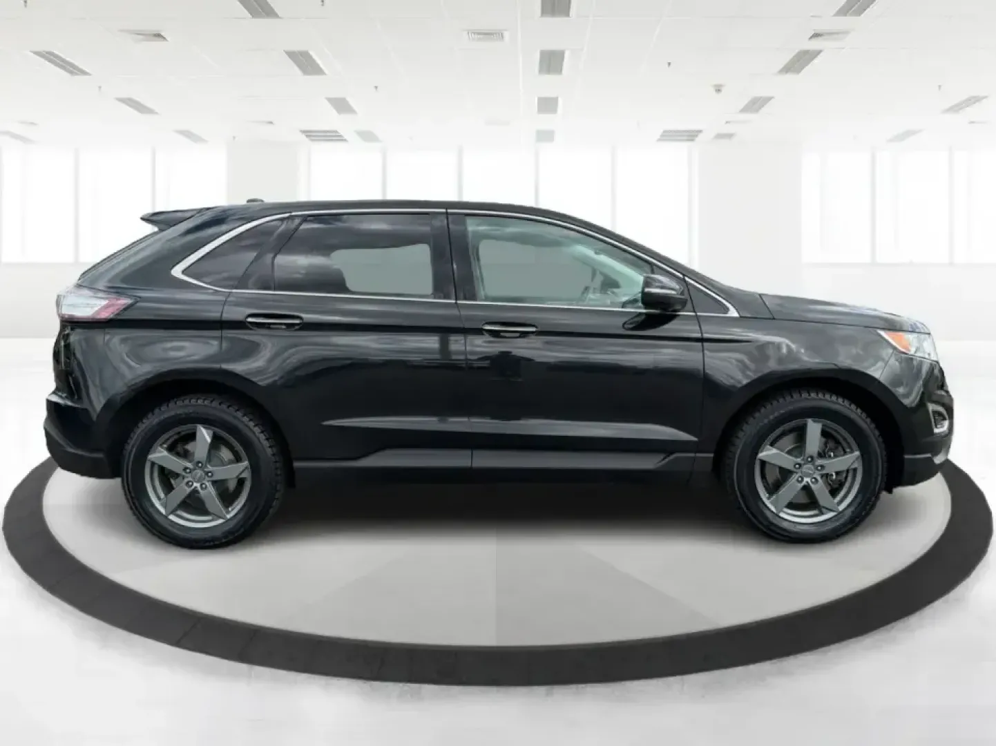 2015 Ford Edge Titanium AWD (2FMTK4K82FB) with an 3.5L V6 DOHC 24V engine, 6-Speed Automatic transmission, located at 1184 Kauffman Ave, Fairborn, OH, 45324, (937) 908-9800, 39.807072, -84.030914 - Picture your next Ohio weekend: a comfortable, confident SUV for school drop-offs in Fairborn, a smooth commute to Wright-Patterson AFB, and an easy road trip up I-675 or over to Yellow Springs-without sacrificing style or capability. This 2015 Ford Edge Titanium in Tuxedo Black Metallic brings prem- Photo#1