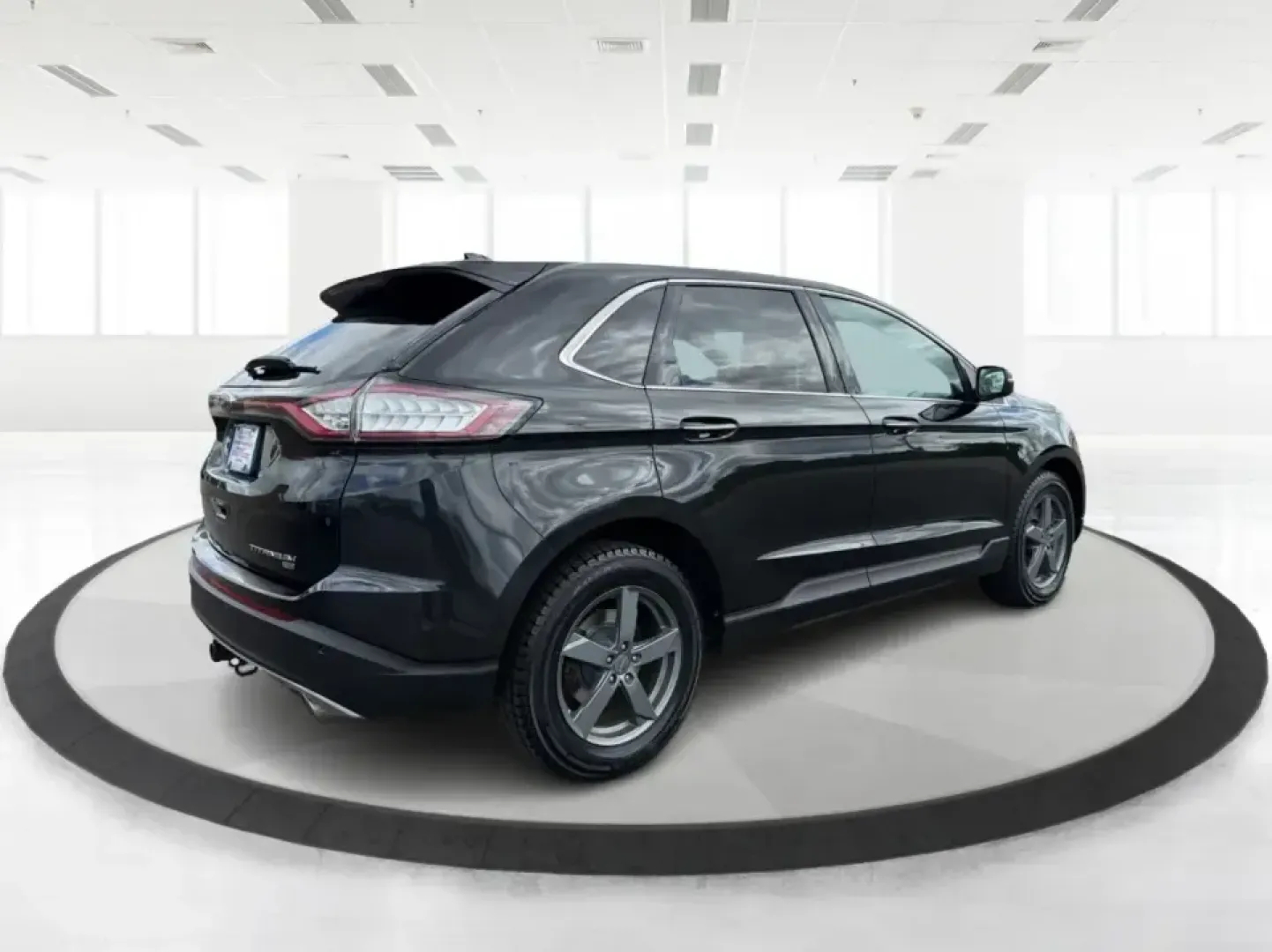 2015 Ford Edge Titanium AWD (2FMTK4K82FB) with an 3.5L V6 DOHC 24V engine, 6-Speed Automatic transmission, located at 1184 Kauffman Ave, Fairborn, OH, 45324, (937) 908-9800, 39.807072, -84.030914 - Picture your next Ohio weekend: a comfortable, confident SUV for school drop-offs in Fairborn, a smooth commute to Wright-Patterson AFB, and an easy road trip up I-675 or over to Yellow Springs-without sacrificing style or capability. This 2015 Ford Edge Titanium in Tuxedo Black Metallic brings prem- Photo#2