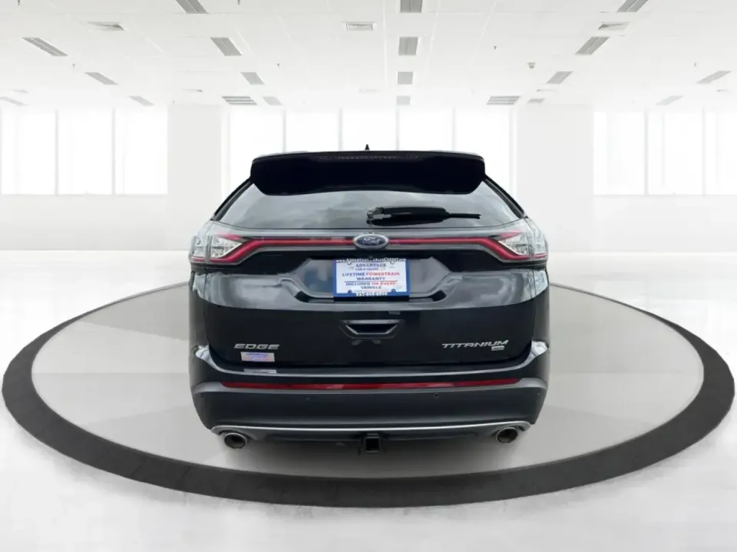 2015 Ford Edge Titanium AWD (2FMTK4K82FB) with an 3.5L V6 DOHC 24V engine, 6-Speed Automatic transmission, located at 1184 Kauffman Ave, Fairborn, OH, 45324, (937) 908-9800, 39.807072, -84.030914 - Picture your next Ohio weekend: a comfortable, confident SUV for school drop-offs in Fairborn, a smooth commute to Wright-Patterson AFB, and an easy road trip up I-675 or over to Yellow Springs-without sacrificing style or capability. This 2015 Ford Edge Titanium in Tuxedo Black Metallic brings prem- Photo#3
