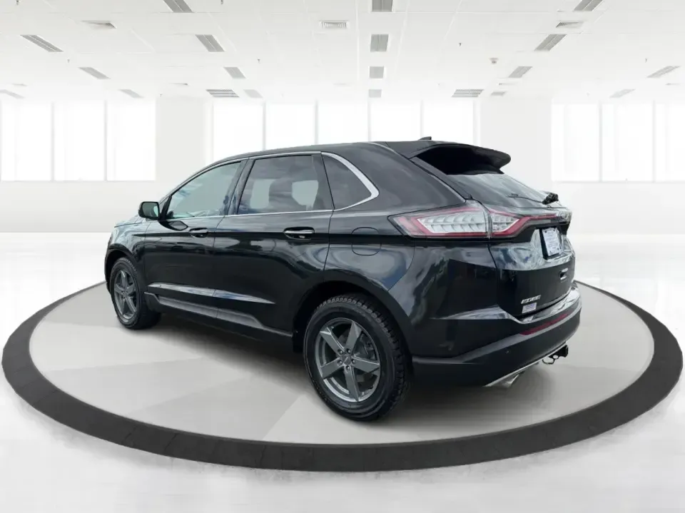 2015 Ford Edge Titanium (2FMTK4K82FB) with an 3.5L V6 DOHC 24V engine, 6-Speed Automatic transmission, located at 1184 Kauffman Ave, Fairborn, OH, 45324, (937) 908-9800, 39.807072, -84.030914 - Need a comfortable, confident SUV for Dayton-area commuting, school drop-offs, and spontaneous weekend getaways to Yellow Springs? This 2015 Ford Edge Titanium in Tuxedo Black Metallic blends everyday practicality with upscale features, giving you a road-trip-ready ride that fits a busy life in Fair - Photo#4