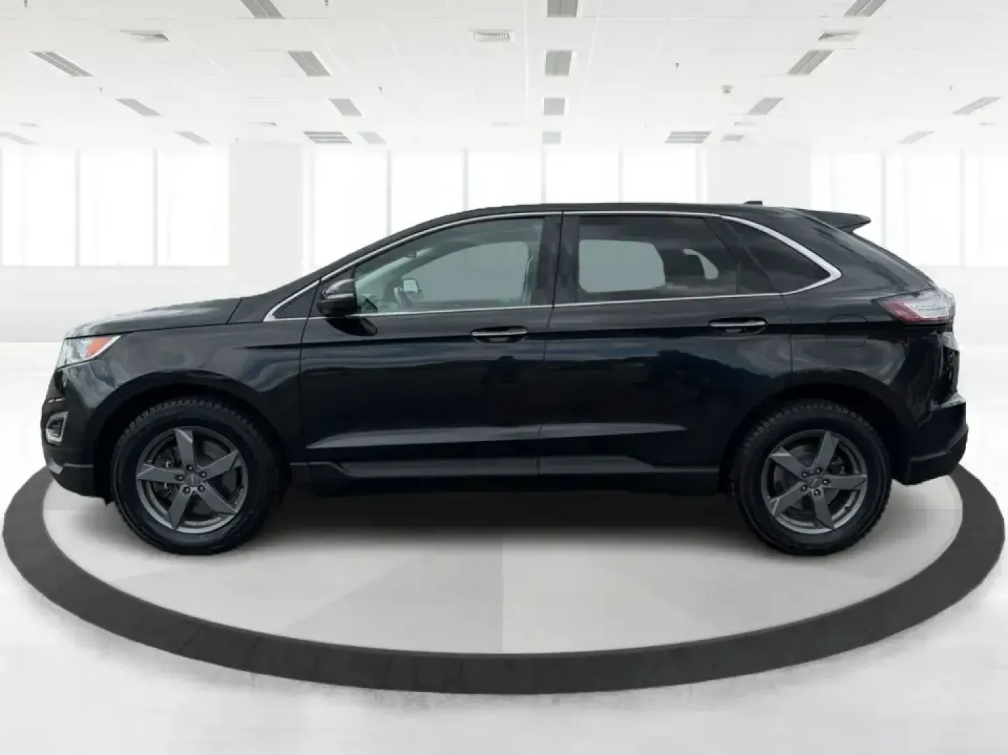 2015 Ford Edge Titanium AWD (2FMTK4K82FB) with an 3.5L V6 DOHC 24V engine, 6-Speed Automatic transmission, located at 1184 Kauffman Ave, Fairborn, OH, 45324, (937) 908-9800, 39.807072, -84.030914 - Picture your next Ohio weekend: a comfortable, confident SUV for school drop-offs in Fairborn, a smooth commute to Wright-Patterson AFB, and an easy road trip up I-675 or over to Yellow Springs-without sacrificing style or capability. This 2015 Ford Edge Titanium in Tuxedo Black Metallic brings prem- Photo#5