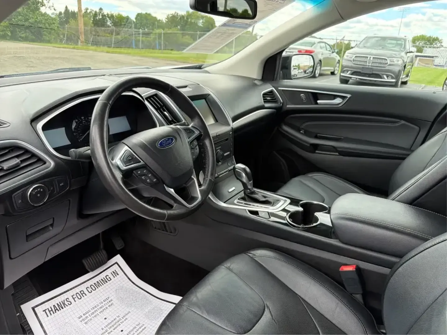 2015 Ford Edge Titanium AWD (2FMTK4K82FB) with an 3.5L V6 DOHC 24V engine, 6-Speed Automatic transmission, located at 1184 Kauffman Ave, Fairborn, OH, 45324, (937) 908-9800, 39.807072, -84.030914 - Picture your next Ohio weekend: a comfortable, confident SUV for school drop-offs in Fairborn, a smooth commute to Wright-Patterson AFB, and an easy road trip up I-675 or over to Yellow Springs-without sacrificing style or capability. This 2015 Ford Edge Titanium in Tuxedo Black Metallic brings prem- Photo#9