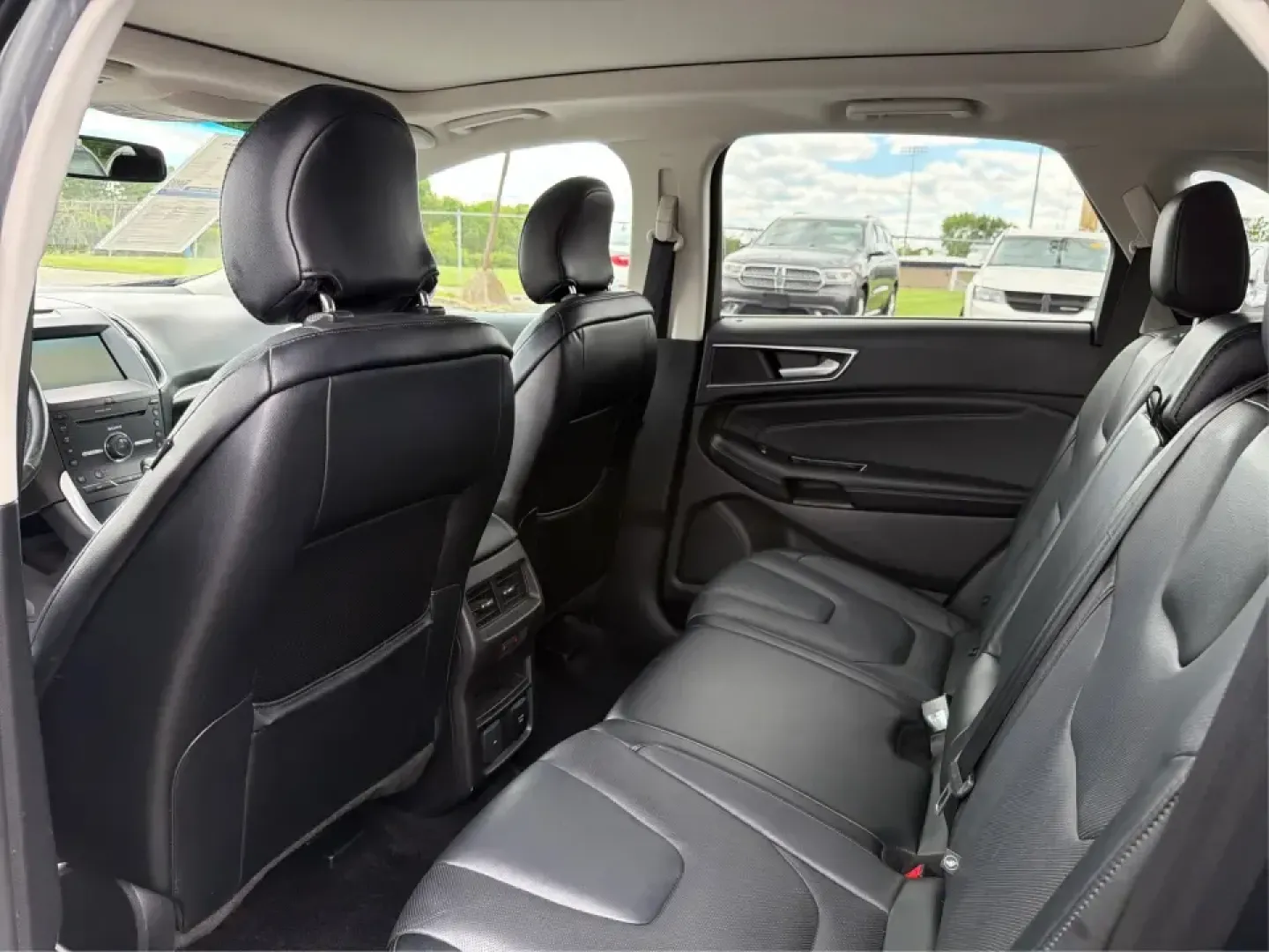 2015 Ford Edge Titanium AWD (2FMTK4K82FB) with an 3.5L V6 DOHC 24V engine, 6-Speed Automatic transmission, located at 1184 Kauffman Ave, Fairborn, OH, 45324, (937) 908-9800, 39.807072, -84.030914 - Picture your next Ohio weekend: a comfortable, confident SUV for school drop-offs in Fairborn, a smooth commute to Wright-Patterson AFB, and an easy road trip up I-675 or over to Yellow Springs-without sacrificing style or capability. This 2015 Ford Edge Titanium in Tuxedo Black Metallic brings prem- Photo#10