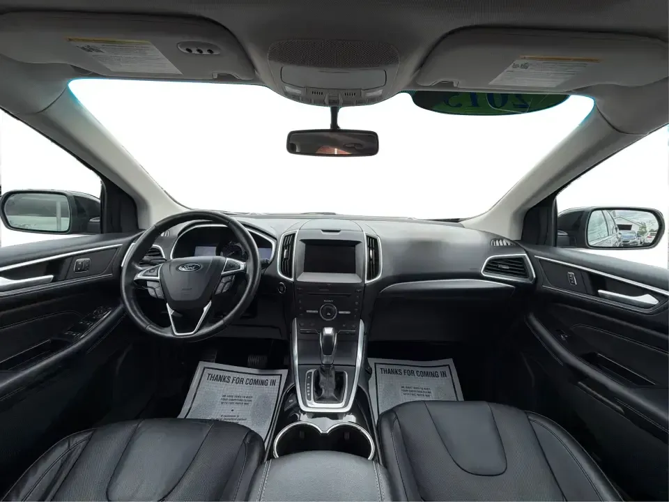 2015 Ford Edge Titanium (2FMTK4K82FB) with an 3.5L V6 DOHC 24V engine, 6-Speed Automatic transmission, located at 1184 Kauffman Ave, Fairborn, OH, 45324, (937) 908-9800, 39.807072, -84.030914 - Need a comfortable, confident SUV for Dayton-area commuting, school drop-offs, and spontaneous weekend getaways to Yellow Springs? This 2015 Ford Edge Titanium in Tuxedo Black Metallic blends everyday practicality with upscale features, giving you a road-trip-ready ride that fits a busy life in Fair - Photo#22