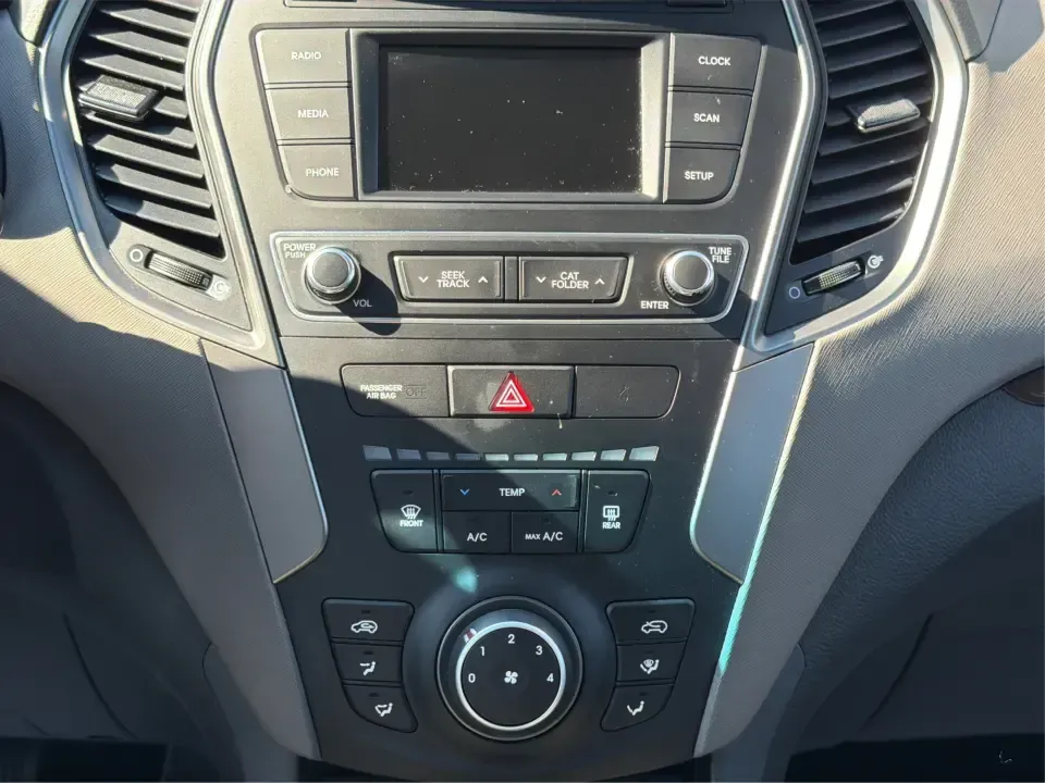 2017 Hyundai Santa Fe 2.4L (5XYZT3LB8HG) with an Theta II 2.4L I-4 gasoline direct injection engine, 6A transmission, located at 8750 N County Rd 25A, Piqua, OH, 45356, (937) 908-9800, 40.164391, -84.232513 - Load up the family, point the GPS toward a weekend getaway, and enjoy the confidence of an SUV that's built for everyday life in Ohio-this **2017 Hyundai Santa Fe 2.4L** is a smart pick for commuting, school runs, and road trips alike. Finished in **Sparkling Silver**, it brings the practical space - Photo#12