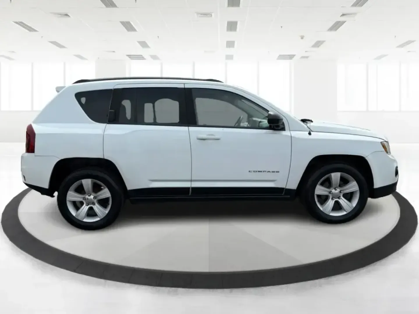 2016 Jeep Compass Sport (1C4NJCBA1GD) with an 2.0L L4 DOHC 16V engine, Automatic transmission, located at 4508 South Dixie Dr, Moraine, OH, 45439, (937) 908-9800, 39.689976, -84.218452 - **Adventure Awaits with the 2016 Jeep Compass Sport in Fairborn, OH!**<br /> <br /> Are you and your family ready to embark on thrilling weekend adventures or find the ideal companion for your daily commute? Look no further! The 2016 Jeep Compass Sport is the perfect SUV for those who need a dependa- Photo#1