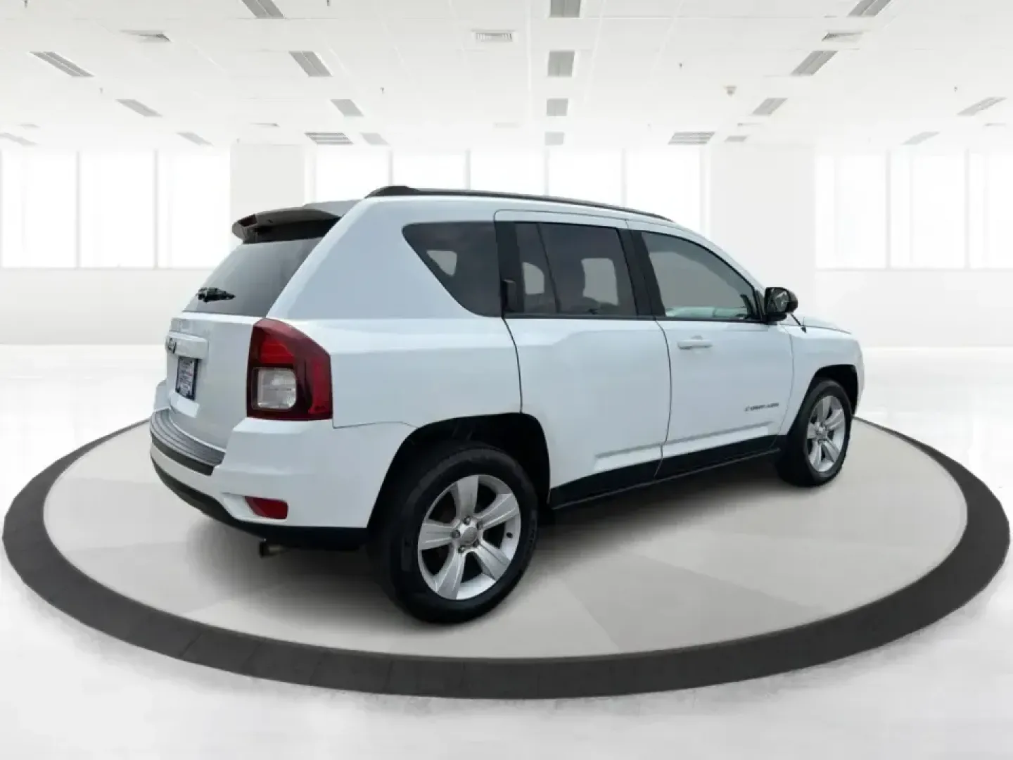 2016 Jeep Compass Sport (1C4NJCBA1GD) with an 2.0L L4 DOHC 16V engine, Automatic transmission, located at 4508 South Dixie Dr, Moraine, OH, 45439, (937) 908-9800, 39.689976, -84.218452 - **Adventure Awaits with the 2016 Jeep Compass Sport in Fairborn, OH!**<br /> <br /> Are you and your family ready to embark on thrilling weekend adventures or find the ideal companion for your daily commute? Look no further! The 2016 Jeep Compass Sport is the perfect SUV for those who need a dependa- Photo#2