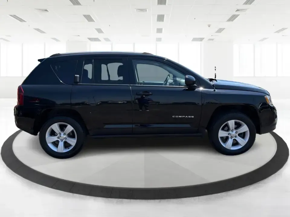 2017 Jeep Compass Latitude 4x4 (1C4NJDEB3HD) with an 2.4L I-4 DOHC engine, 6A transmission, located at 1230 East Main St, Xenia, OH, 45385, (937) 908-9800, 39.688026, -83.910172 - Ready for weekend escapes to John Bryan State Park, everyday school drop-offs, and confident winter commutes on US-35? This 2017 Jeep Compass Latitude 4x4 in Black Clearcoat is the kind of compact SUV that fits real life in Xenia, OH-easy to park around downtown, comfortable for long drives toward D - Photo#1