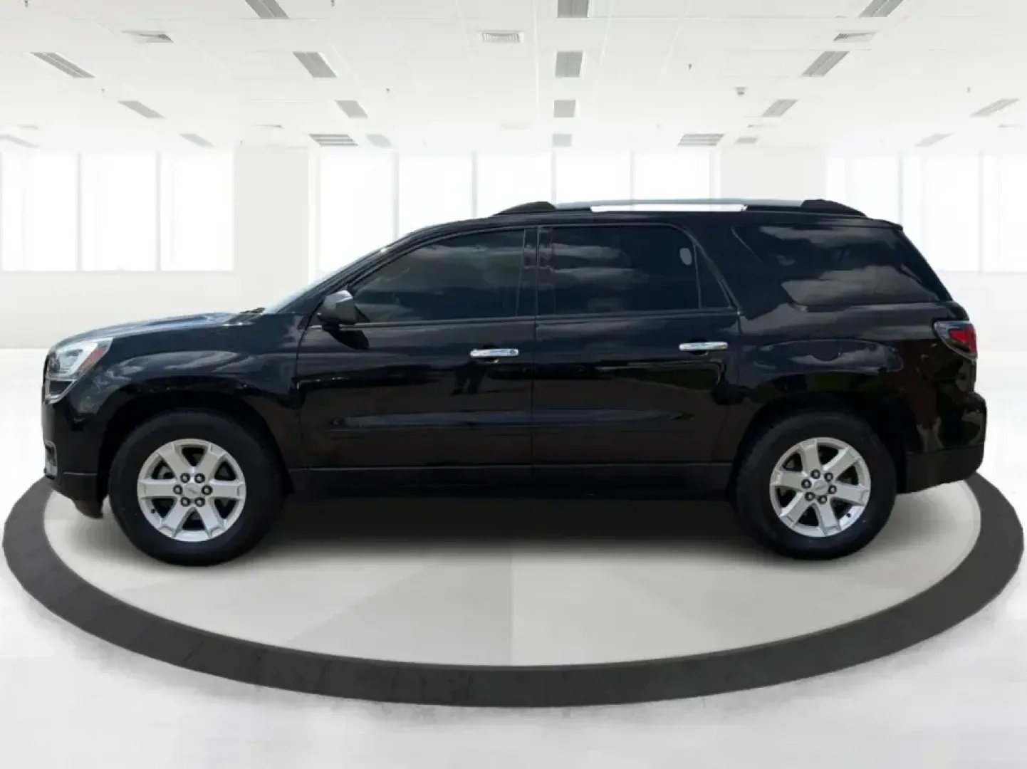 2016 GMC Acadia SLE-2 (1GKKVPKD1GJ) with an 3.6L V-6 gasoline direct injection engine, 6A transmission, located at 401 Woodman Dr, Riverside, OH, 45431, (937) 908-9800, 39.760899, -84.123421 - Need one SUV that can handle school drop-offs, long commutes, and weekend getaways to the MetroParks without feeling cramped? This 2016 GMC Acadia SLE-2 in Ebony Twilight Metallic is a smart fit for busy families and active drivers who want three-row flexibility, confident traction, and everyday com- Photo#5